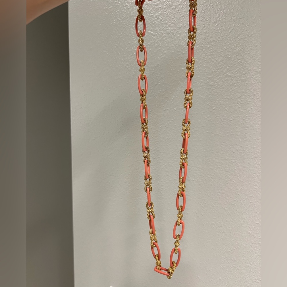 Kate Spade light orange, and gold necklace.